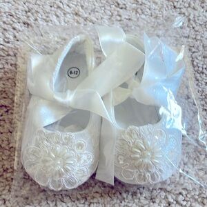 Adorable white baby shoes great for wedding, baptism etc